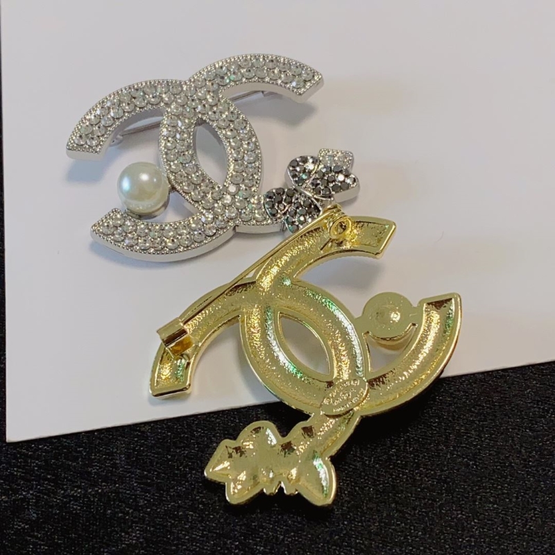 Ch**el brooches